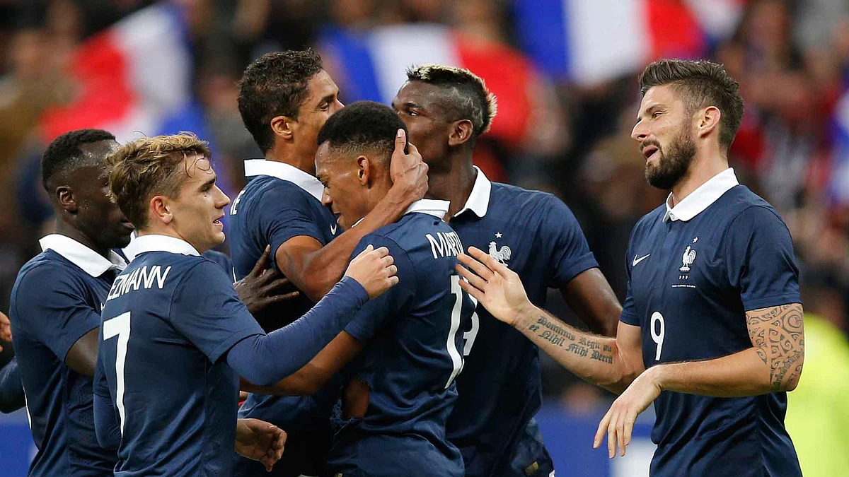 France’s Olivier Giroud with his teammates after scoring the opening goal during the international friendly. (Photo: AP)