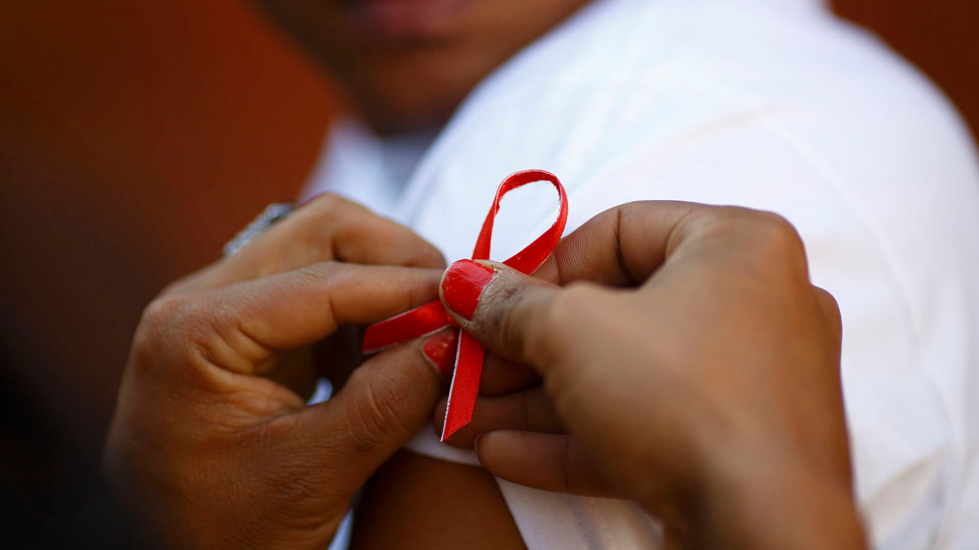 A red ribbon in support of HIV positive patients. (Photo: Reuters)