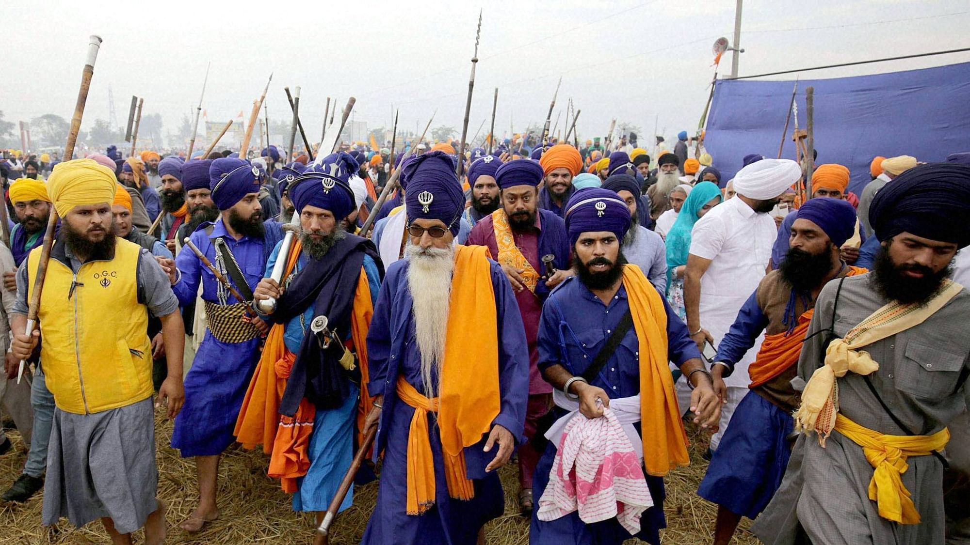  Nihangs arrive to participate in Sarbat Khalsa with their traditional weapons at Chaba village near Amritsar on Tuesday.  (Photo: PTI)