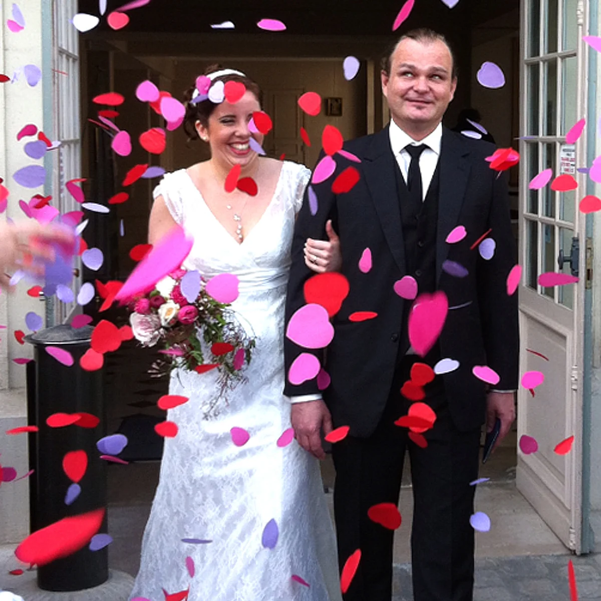 Anne Cornet Guyomard and Pierre-Yves Guyomard are showered with confetti on their wedding day in Saint-Germain-en-Laye, France, 2013. (Photo: AP)