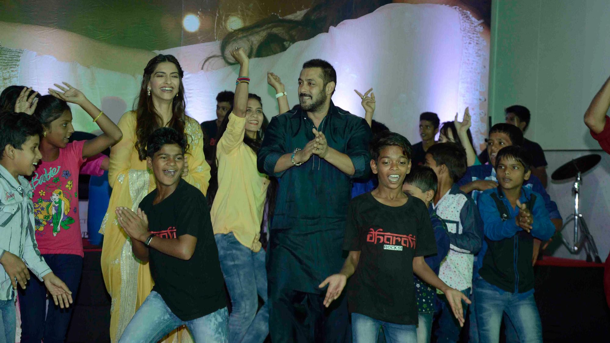 Salman Khan and Sonam Kapoor dancing with members of the Dharavi Rocks Band. (Photo: Yogen Shah)