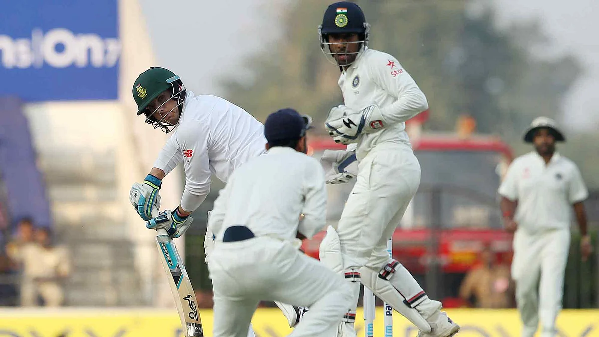 Stiaan van Zyl of South Africa looks back as Ajinkya Rahane takes the catch to dismiss him. (Photo: Ron Gaunt / BCCI / SPORTZPICS)