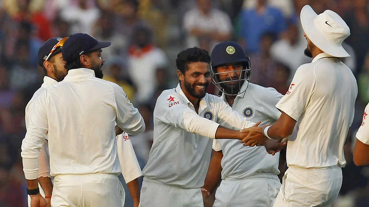Ravindra Jadeja and the Indian team celebrate a South African wicket near the end of Day 1 of the Nagpur Test. (Photo: Reuters)