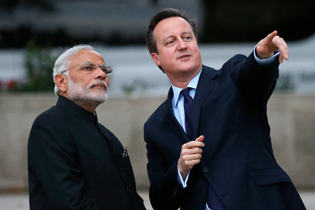 PM Narendra Modi with his British counterpart David Cameron. (Photo: Reuters)