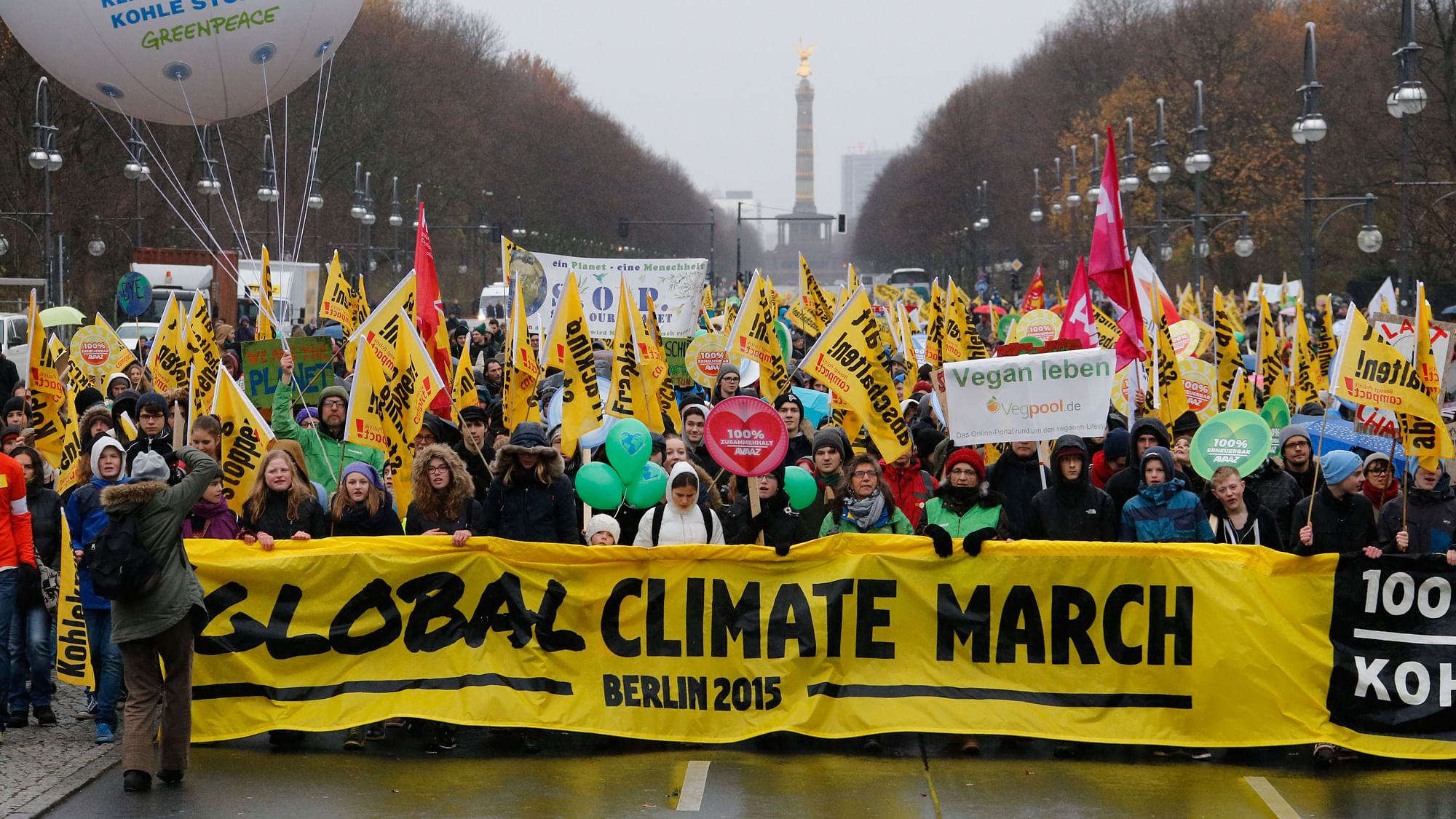 People demonstrate during a protest march ahead of the 2015 Paris Climate Conference, known as the COP21 summit, along Strasse des 17 Juni in Berlin, Germany. (Photo: Reuters)