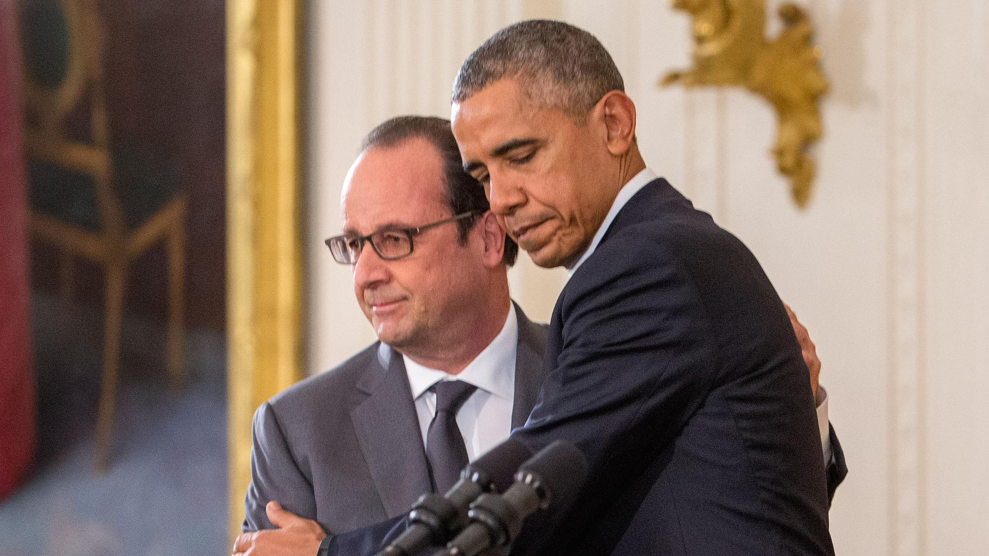 President Barack Obama and French President Francois Hollande embrace during a joint news conference in the East Room of the White House in Washington. (Photo: AP)