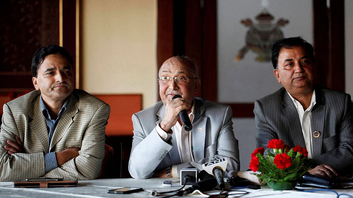 KP Sharma Oli (centre) speaks during a press meet in Kathmandu in October. (Photo: PTI)