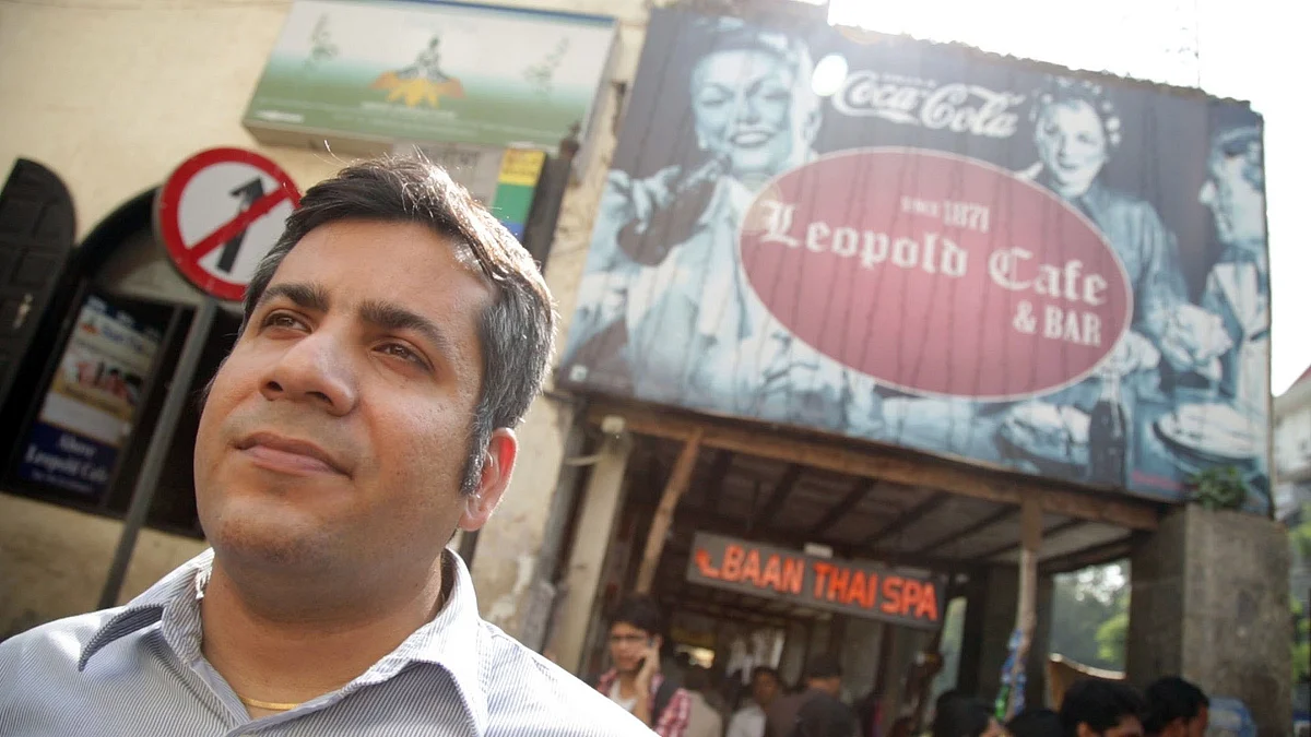 Sourav Mishra stands outside Leopold Cafe, where he was having dinner with friends on the night of November 26, 2008 (Photo: The Quint)