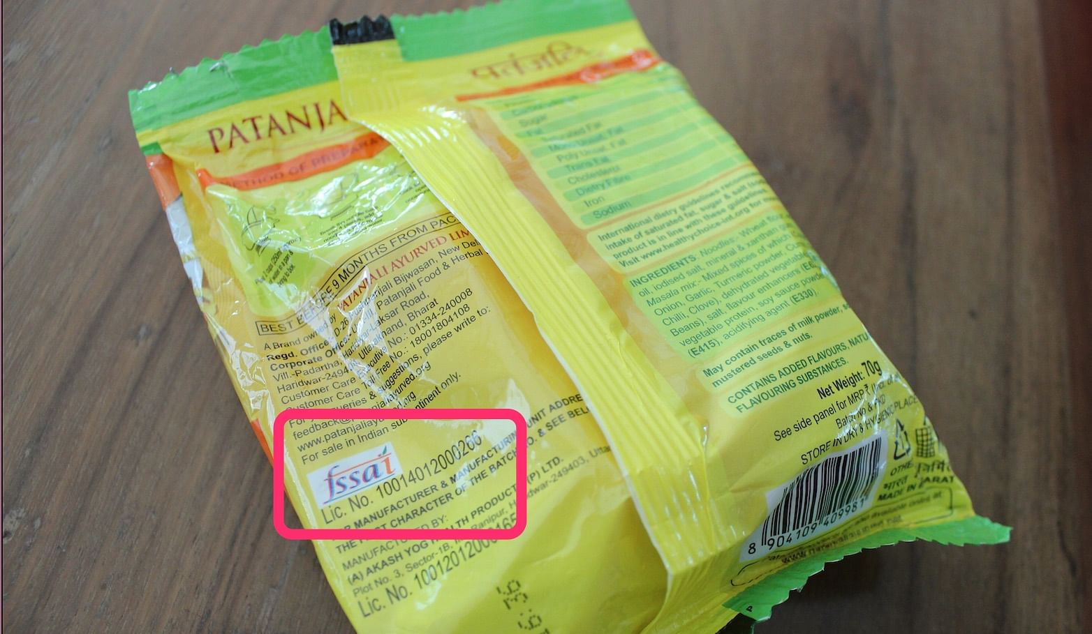 A Patanjali Atta Noodle packet showing the FSSAI licence. (Photo: Aaqib Raza Khan/ The Quint)