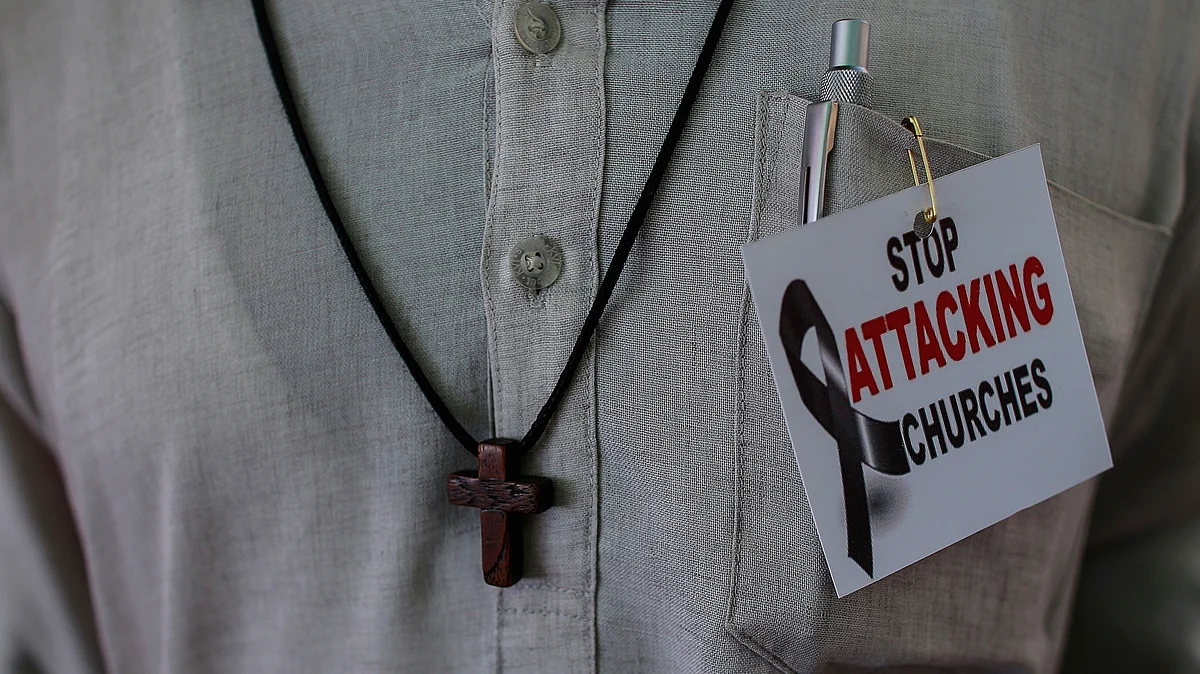 A protester attends a rally by hundreds of Christians against recent attacks on churches nationwide, in Mumbai February 9, 2015 (Photo: Reuters)
