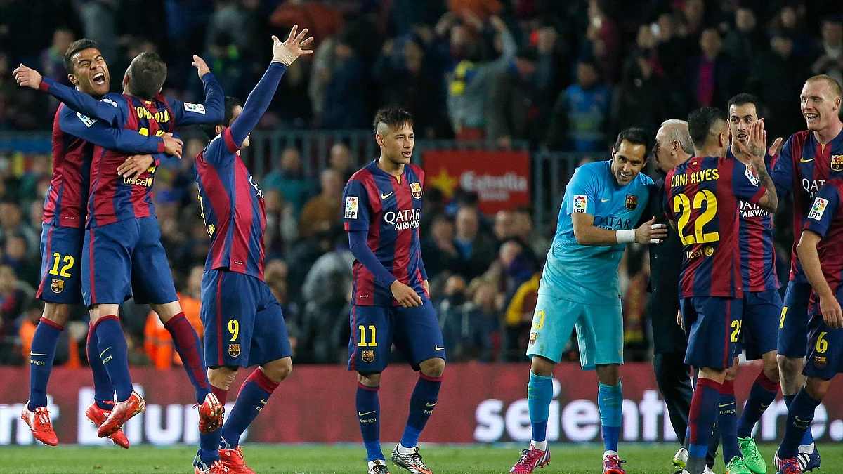 Barcelona’s players celebrate their victory 2-1 against Real Madrid at the end of their clash against Madrid in March this year. (Photo: Reuters)