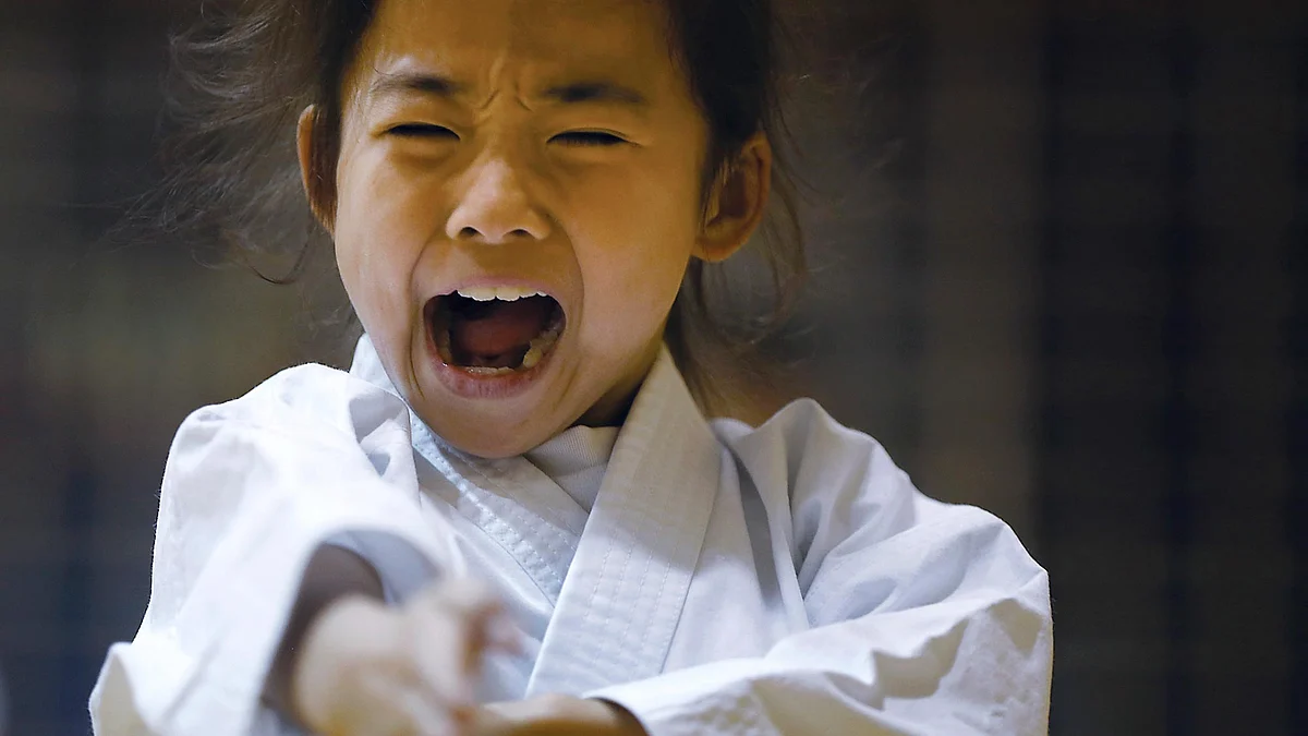 In this Nov. 18, 2015 photo, 9-year-old Mahiro Takano, three-time Japan karate champion in her age group, practices in Nagaoka, Niigata Prefecture, north of Tokyo. (Photo: AP)