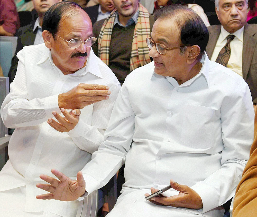 Union Parliamentary Affairs Minister M Venkaiah Naidu with former Finance Minister P Chidambaram at an awards function in New Delhi, November 23, 2015. (Photo: PTI)