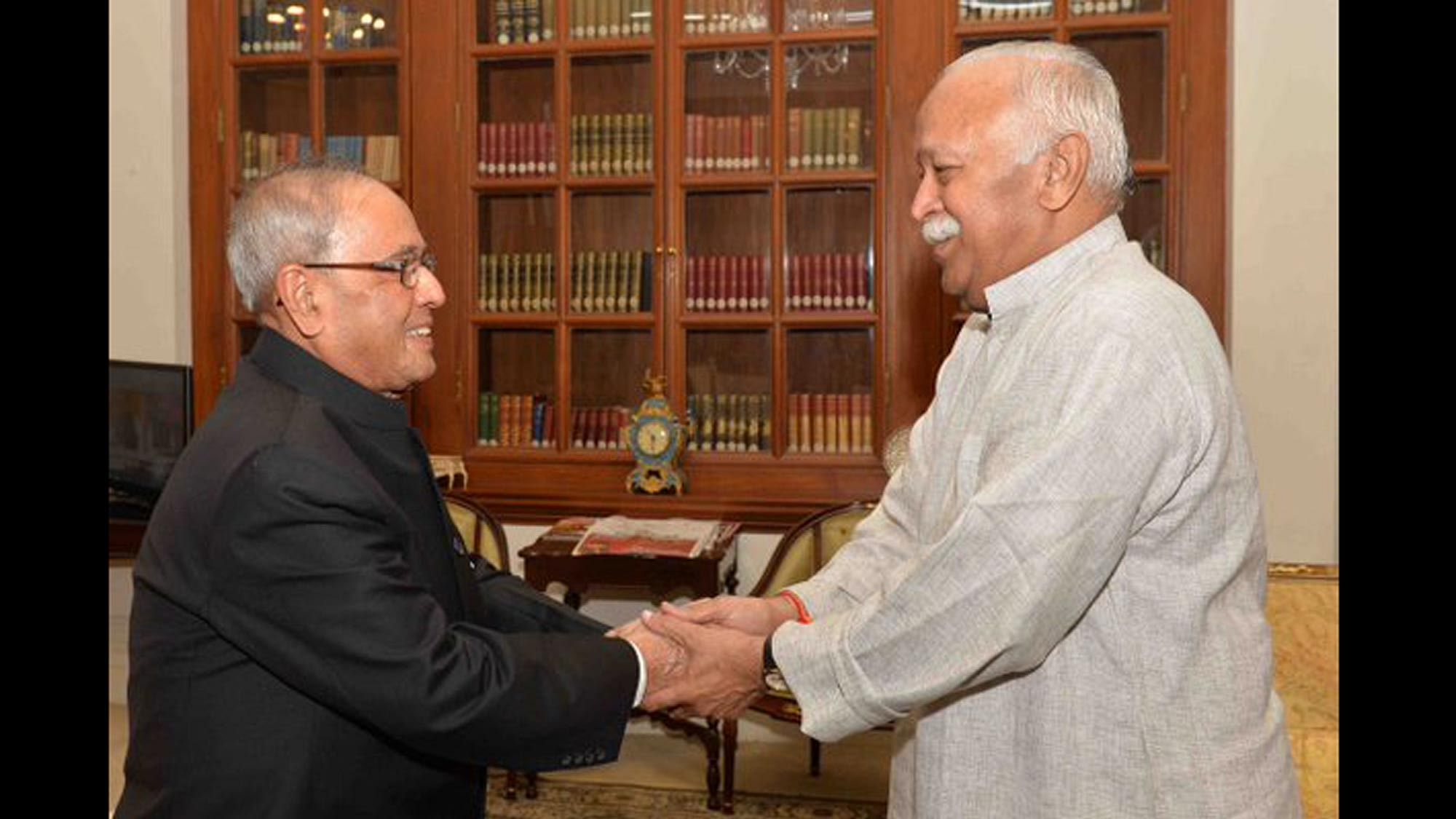 File image of former President Pranab Mukherjee and RSS chief Mohan Bhagwat. 