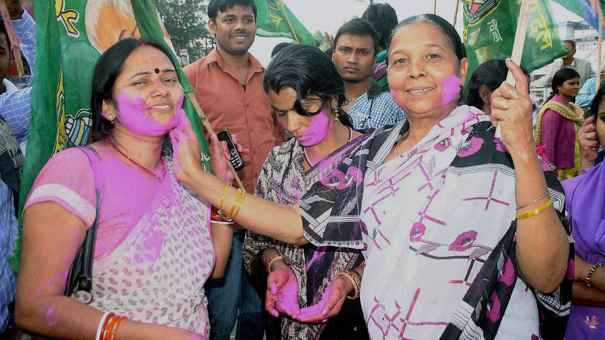 RJD-JD(U) supporters celebrating after the recently concluded Bihar poll results. (Photo: PTI)