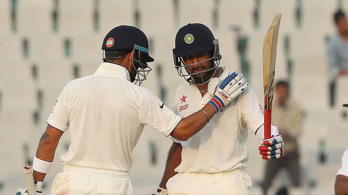 After being bowled out for 201 on day 1, Kohli’s bowlers returned the favour before Pujara took over.