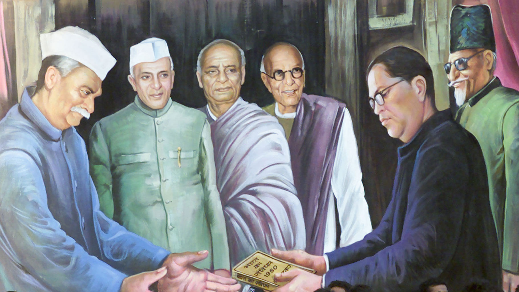 A mural depicting Balasaheb Ambedkar (R), the author of the Indian constitution handing it over to Rajendra Prasad (R), the former President of India. (Photo: Reuters)