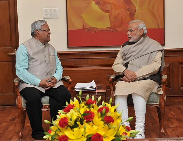 P B Acharya with Prime Minister Narendra Modi. (Photo: <a href="https://twitter.com/PIB_India">PIB India’s Twitter page</a>)