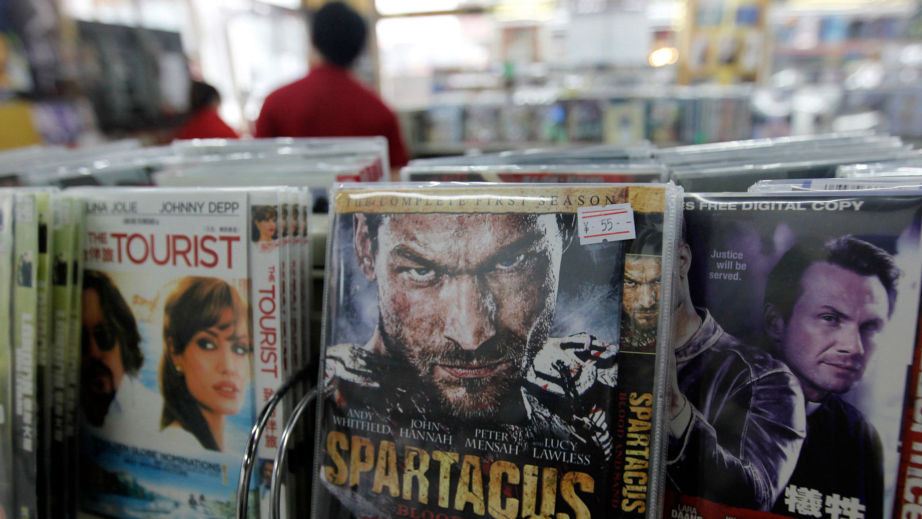 Unlike vinyl records and vintage gramophones, there’s no romance attached to DVDs and video players. (Photo: Reuters)