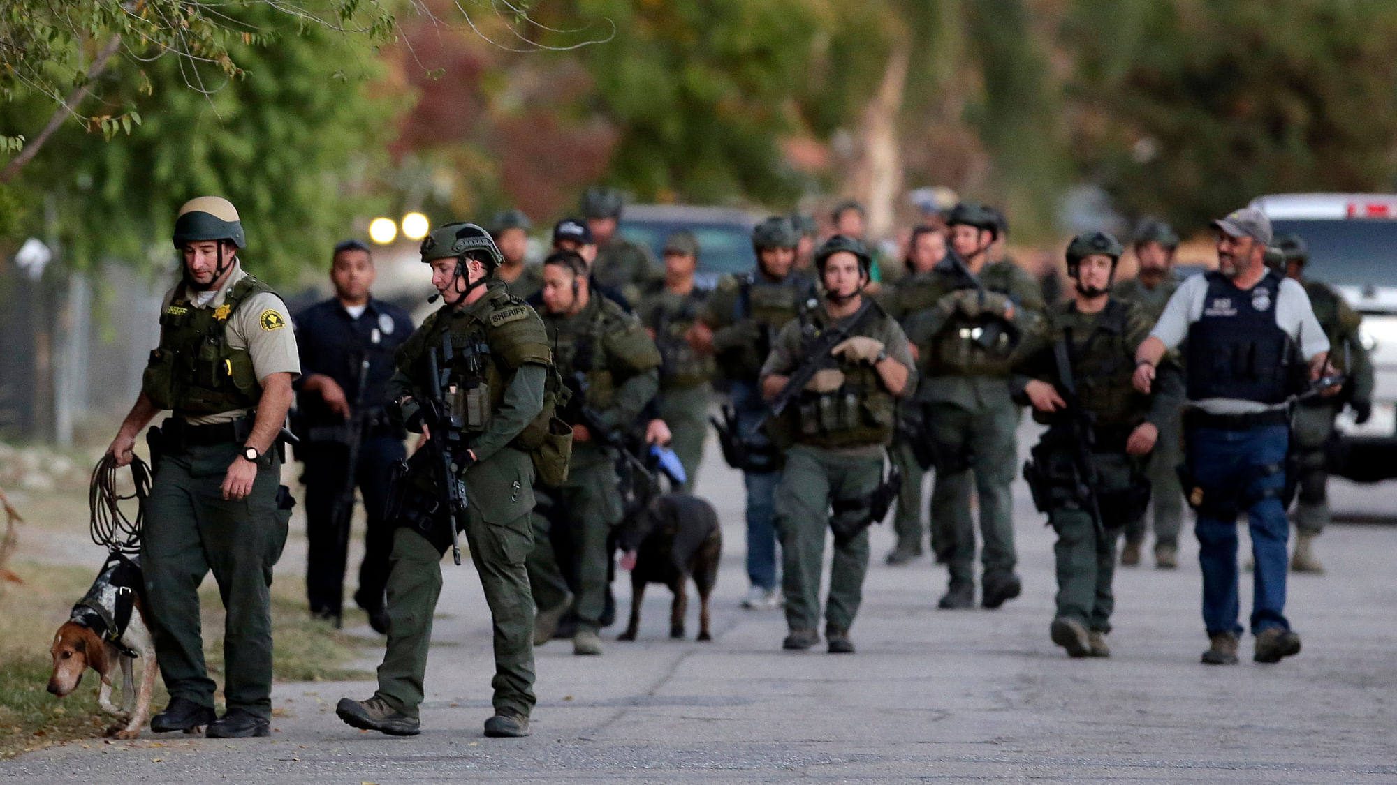Authorities search for a suspect following a shooting that killed multiple people at a social services facility Wednesday, December 2, 2015, in San Bernardino, California (Photo: AP)   