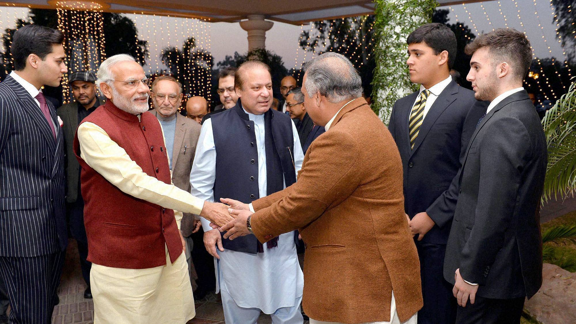 Prime Minister Narendra Modi is greeted at the residence of his Pakistani counterpart Nawaz  in Lahore on Friday. (Photo: PTI)