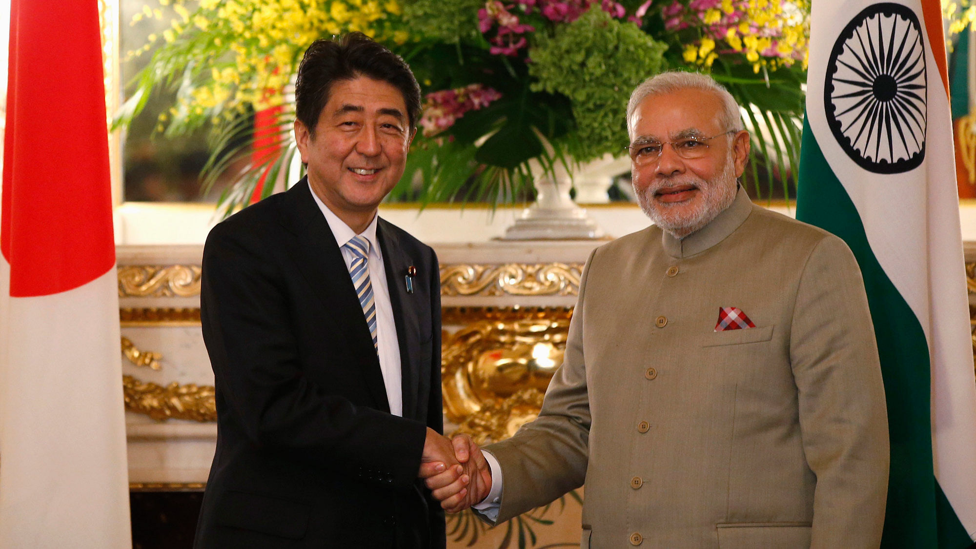  Prime Minister of Japan Shinzo Abe and Prime Minister Modi shake hands at the Tokyo Summit in 2014. (Photo: Reuters)