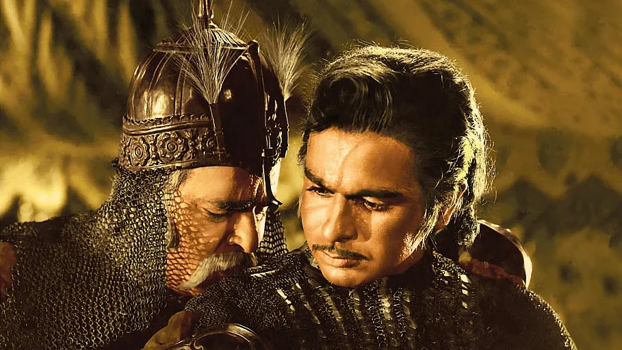 Dilip Kumar with Prithviraj Kapoor in <i>Mughal E Azam. </i>(Photo Courtesy: Screen grab of<i> Mughal-E-Azam</i>)