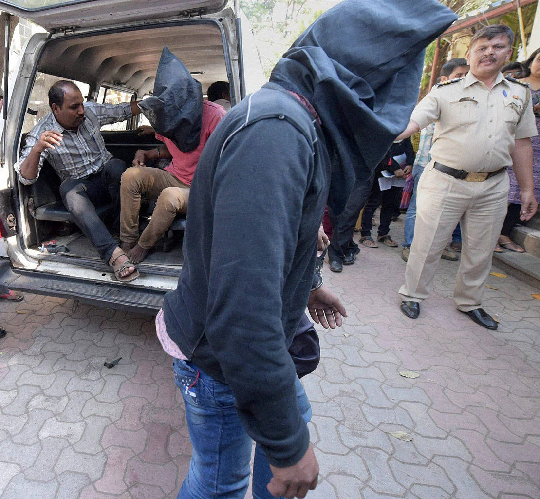 Hema Upadhyay Murder case accused Pradeep Rajbhar and Vijay Rajbhar being produced in a court, in Mumbai on Tuesday. (Photo: PTI) 