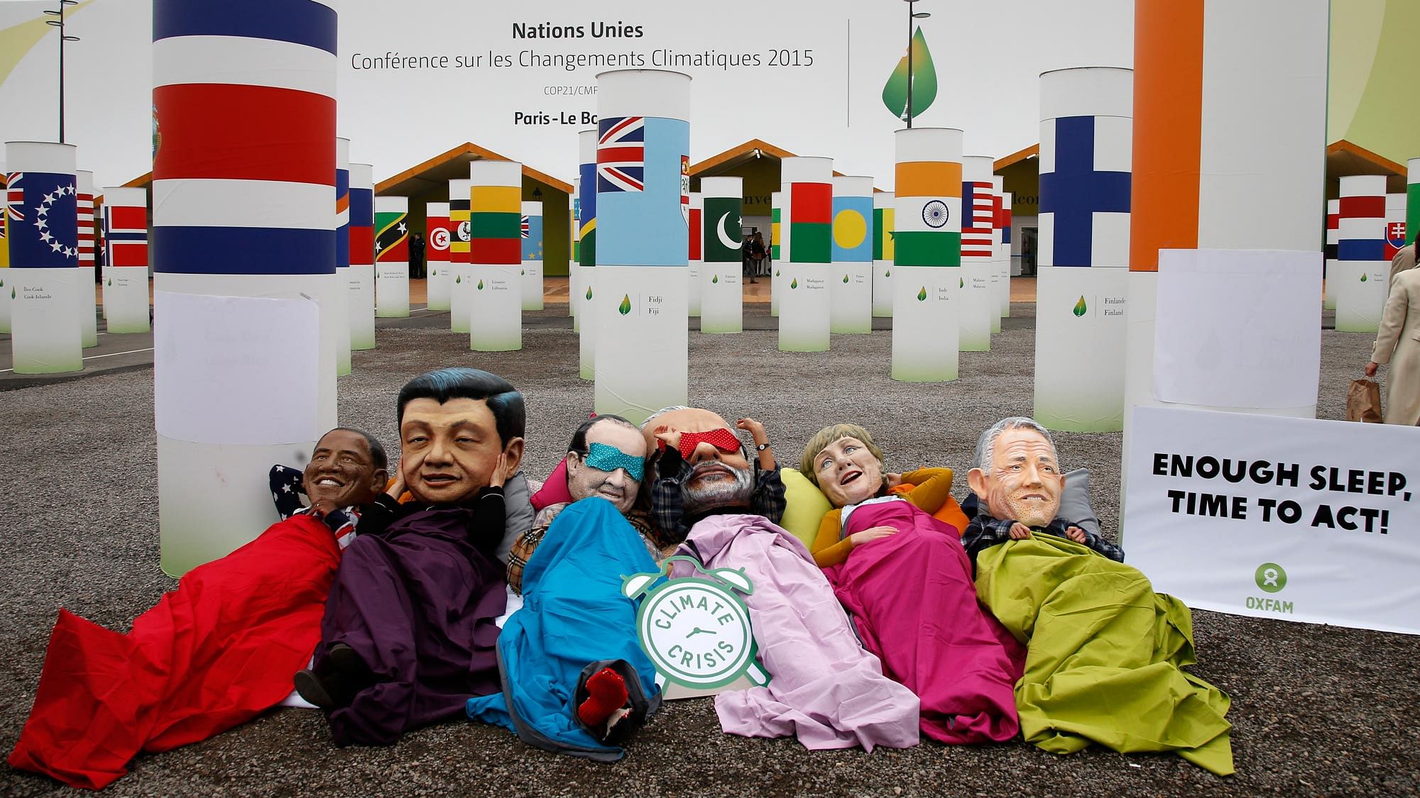 Oxfam activists  stage a protest wearing masks of world leaders outside the venue of the World Climate Change Conference 2015 (COP21) in Le Bourget, near Paris, France, December 10, 2015. (Photo: Reuters)