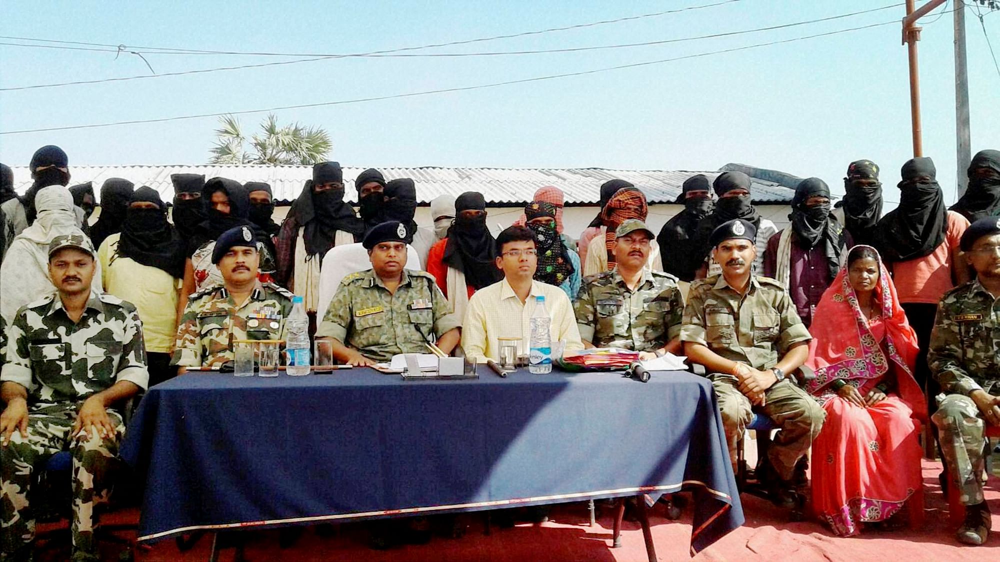 Naxals surrendered to Inspector General of Police SRP Kaluri in Sukma on Tuesday. (Photo: PTI)&nbsp;