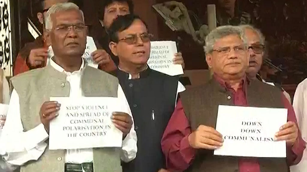 Left parties led by Sitaram Yechury and D Raja protest outside the Parliament house over ‘increasing intolerance’. (Photo: ANI screengrab)