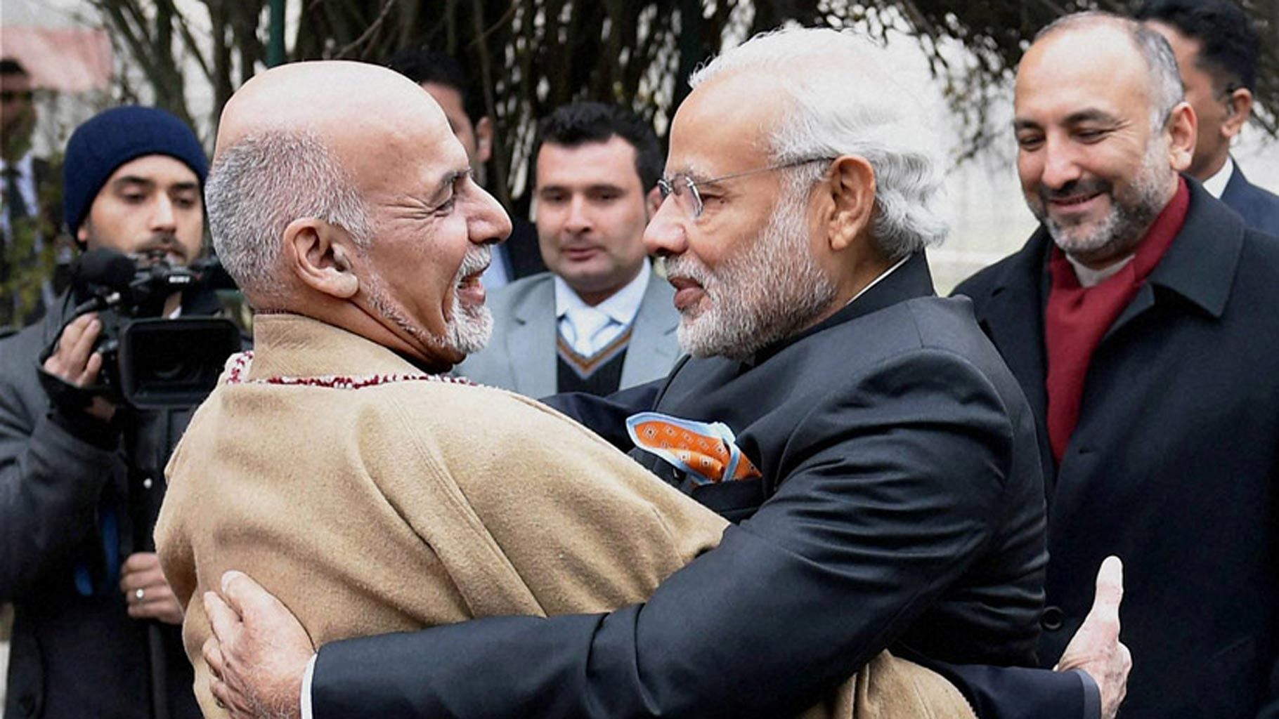 Prime Minister Narendra Modi and Afghan President Ashraf Ghani hug each other during a welcome ceremony at President Palace in Kabul on Friday. (Photo: PTI)