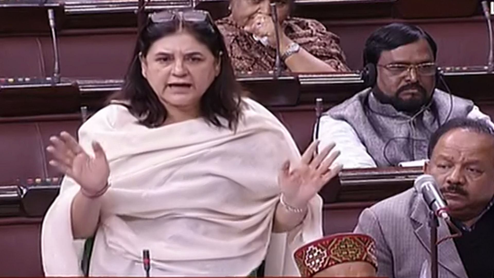 Women and Child Development Minister Maneka Gandhi (centre) introducing the Juvenile Justice Bill in the Rajya Sabha on Tuesday. (Photo: RSTV screengrab)