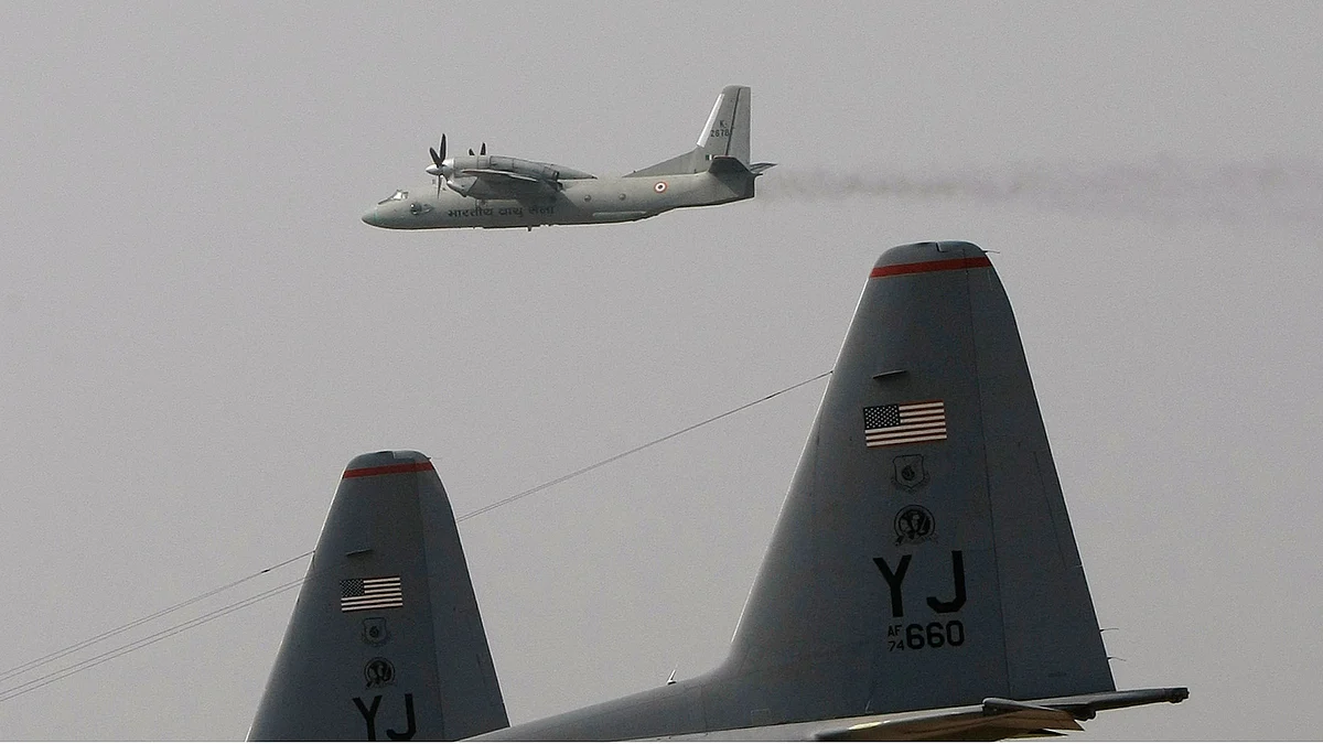 An IAF AN-32 aircraft flies alongside a US Air Force C-130H plane during ‘Cope-India-09’, a joint exercise between the air forces of the two countries on the outskirts of Agra, October 19, 2009. (Photo: Reuters)
