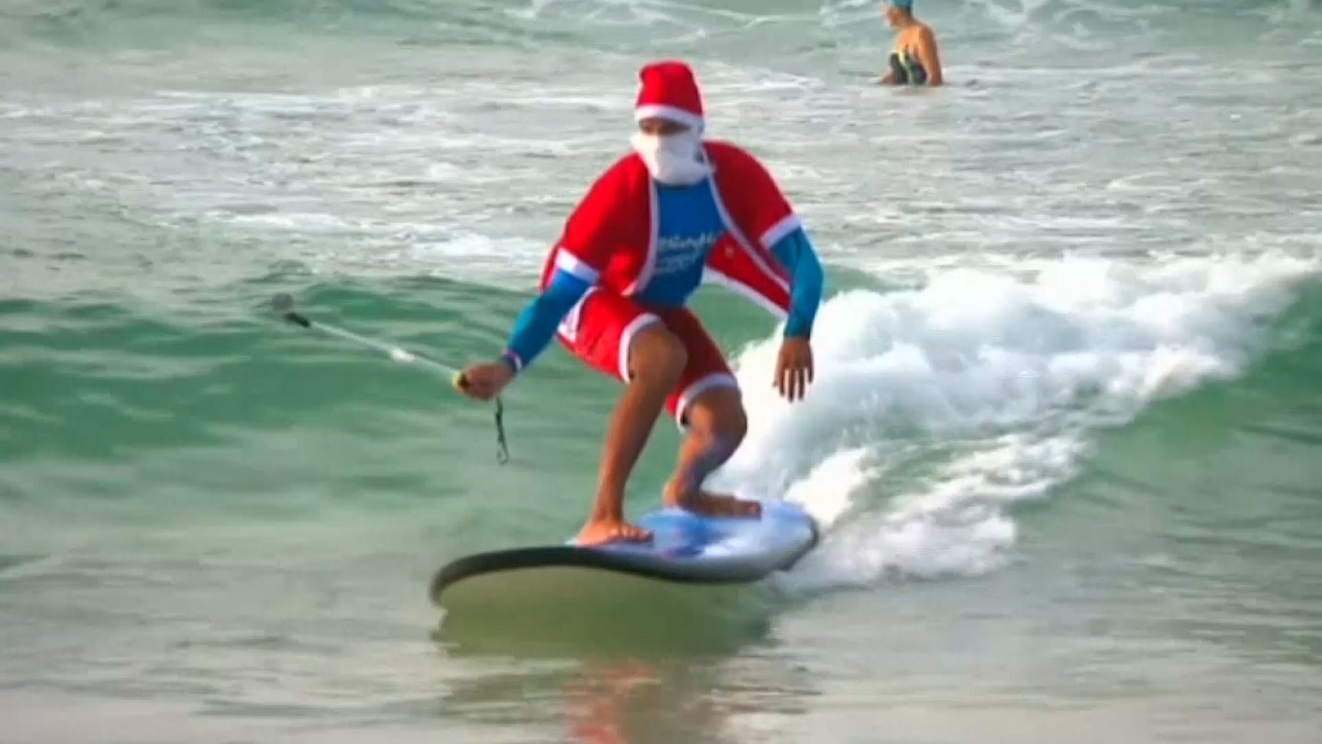 

Santa Claus swapped his sleigh for a surfboard at Sydney’s Bondi Beach with the ongoing Chrismas fever. (Photo: AP screengrab)