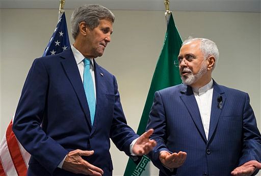 Deal  would curb Iran’s nuclear activities in exchange for  its access to billions in frozen assets and oil revenue.