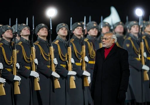 Indian Prime Minister Narendra Modi, reviews an honour guard upon arrival at Moscow’s Government Vnukovo II Airport outside Moscow, Russia. (Photo: AP)