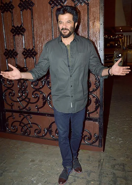 Birthday boy Anil Kapoor welcomes his guests (Photo: Yogen Shah)