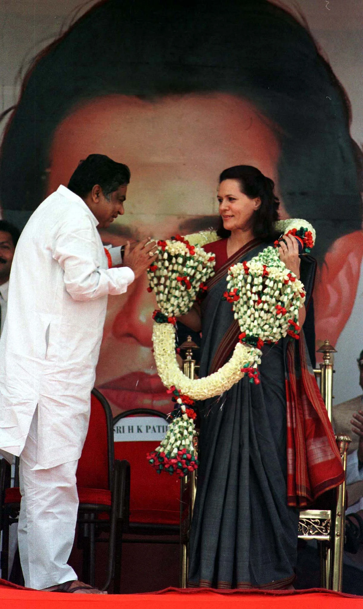 A file photo of Sonia Gandhi being garlanded in Bangalore. (Photo: Reuters)