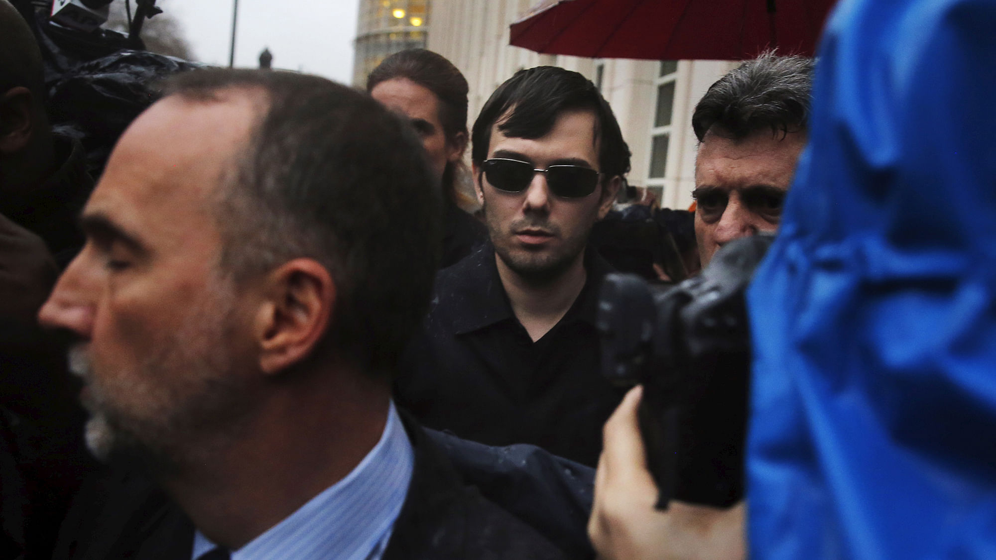 Martin Shkreli (C), chief executive officer of Turing
Pharmaceuticals and KaloBios Pharmaceuticals Inc, departs U.S. Federal Court. (Photo: Reuters)