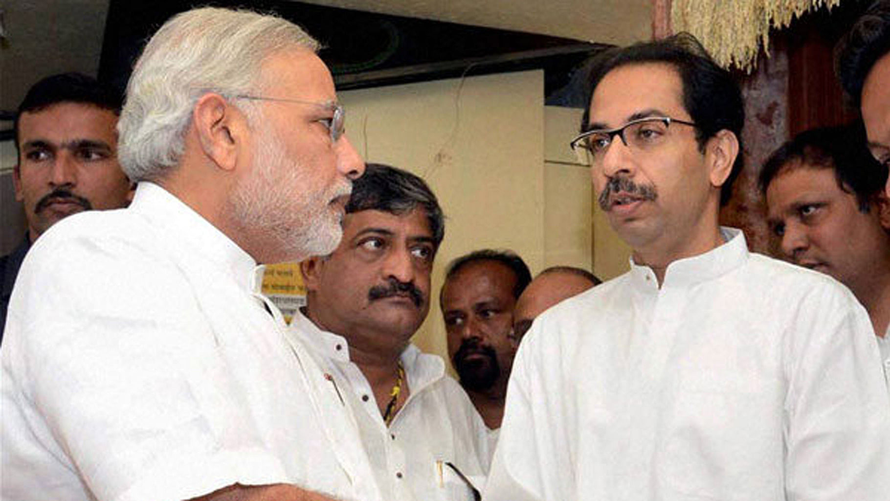 &nbsp; File image of Shiv Sena chief Uddhav Thackeray and PM Narendra Modi. (Photo: PTI)