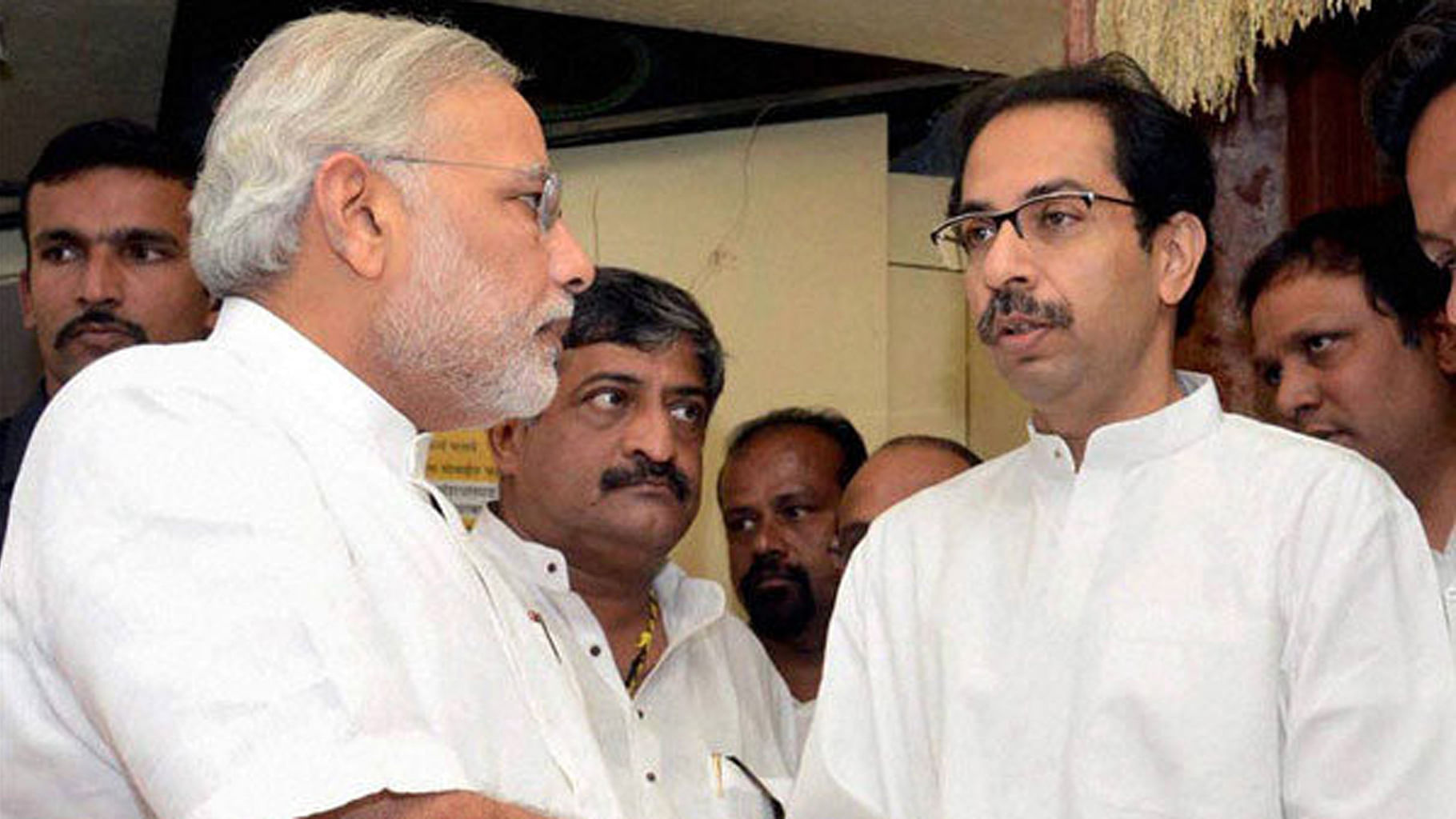 &nbsp; File image of Shiv Sena chief Uddhav Thackeray and PM Narendra Modi. (Photo: PTI)