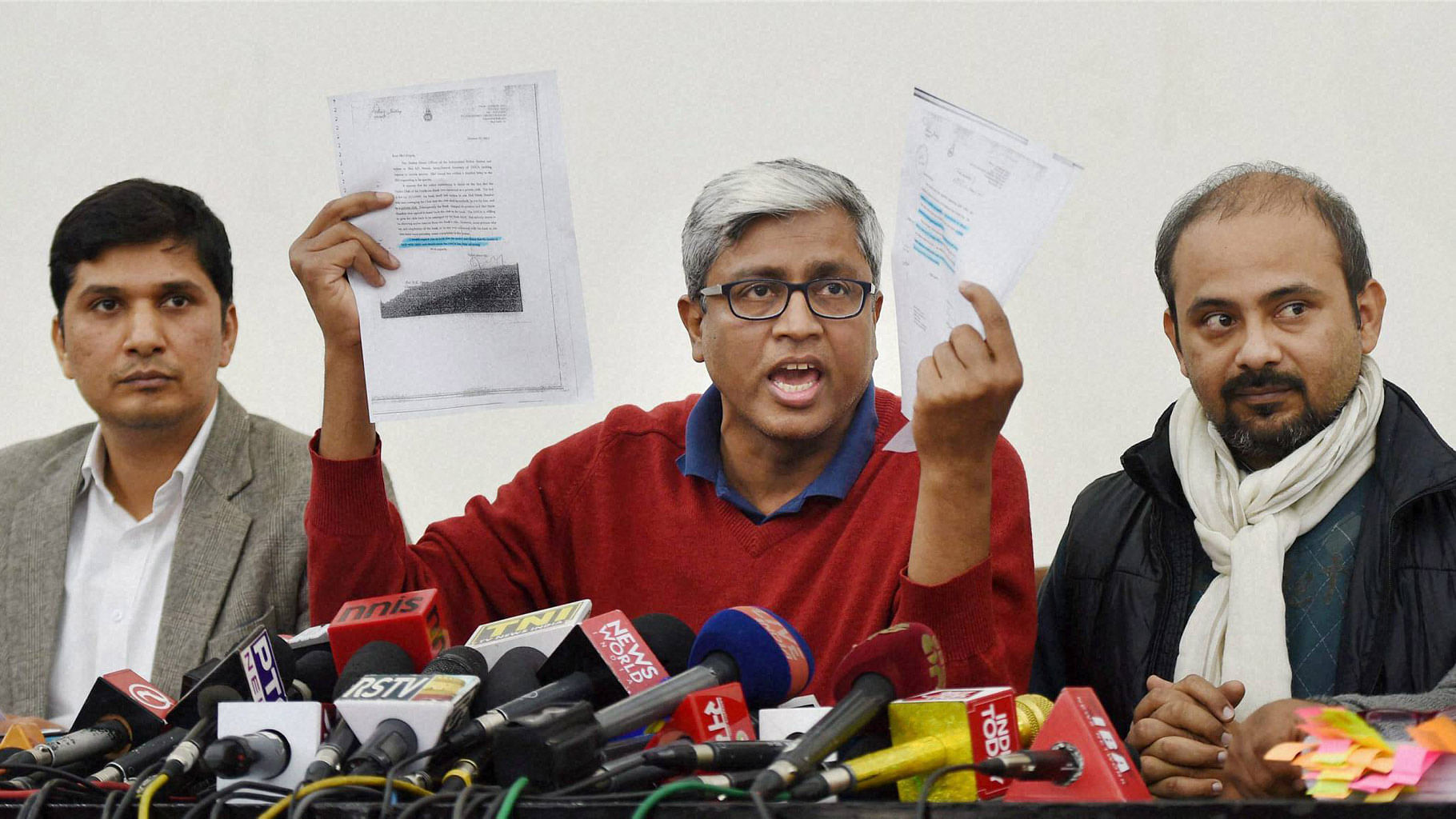 AAP leader Ashutosh waving documents during a press conference. (Photo: PTI)