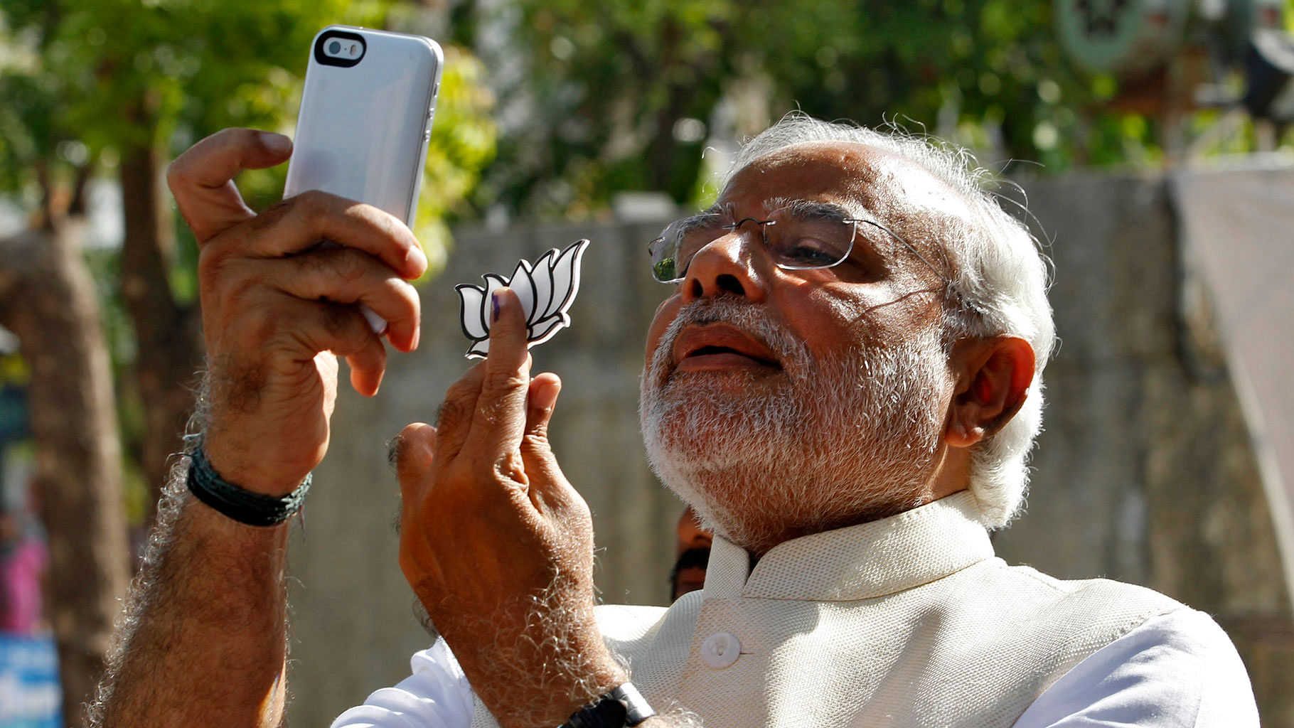 Narendra Modi taking a selfie after casting vote in the 2014 general election. (Photo: Reuters)