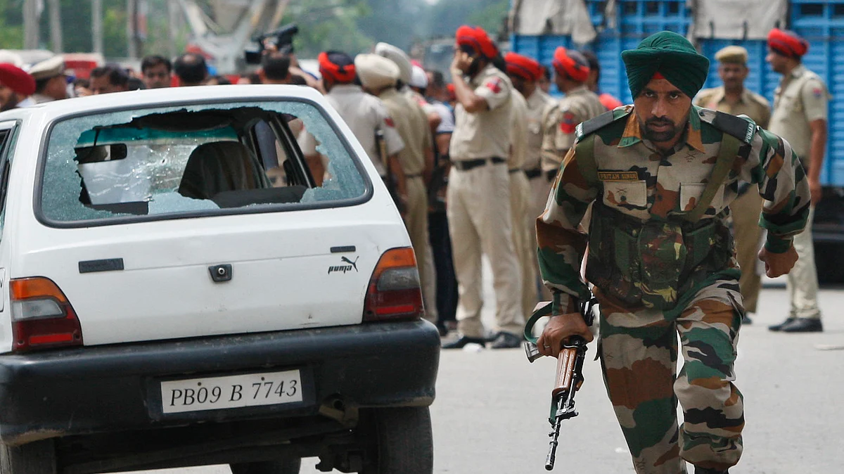 Security personnel at Dinanagar area where the Punjab terror attack took place. (Photo: AP)