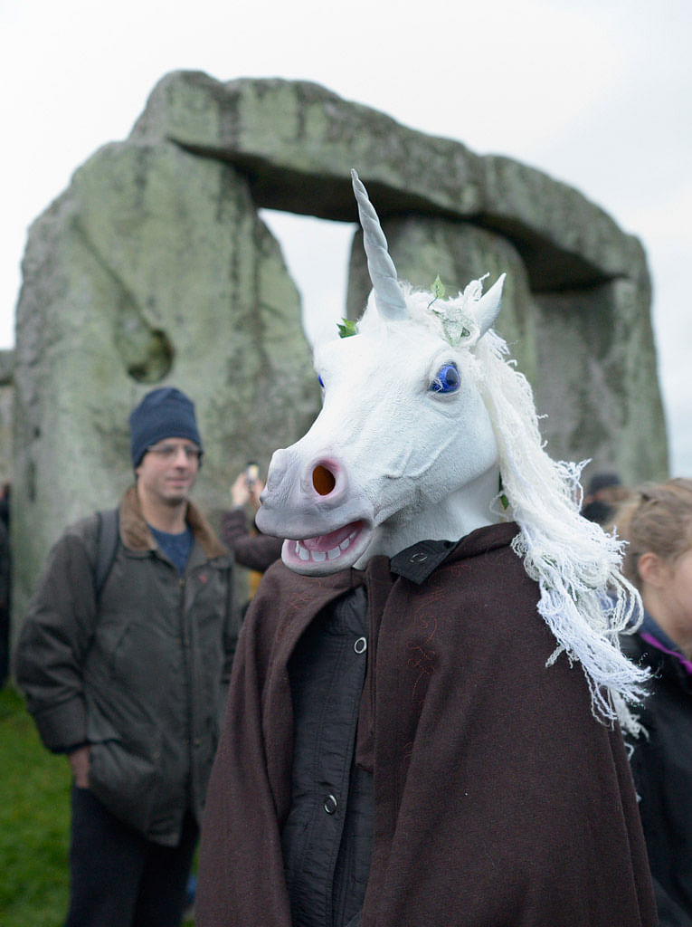 Thousands of people have descended on Britain’s Stonehenge to see the sunrise on the Winter Solstice