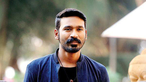 The couple had alleged that the actor was their elder son, Kalaichelvan who was born to them in 1985 in Madurai. (Photo Courtesy: Facebook/<a href="https://www.facebook.com/DhanushKRaja/photos/pb.671503962922594.-2207520000.1443559025./827655373974118/?type=3&amp;theater">@Dhanush</a>)