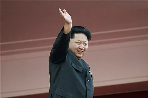 North Korean leader Kim Jong Un waves at a parade in Pyongyang, North Korea. (Photo: AP)