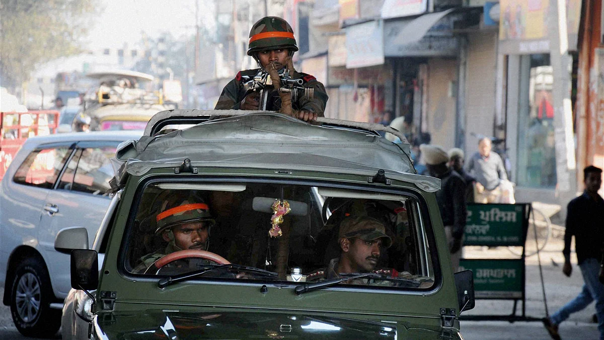 A security personnel guards near the Pathankot Air Force base. (Photo: PTI)