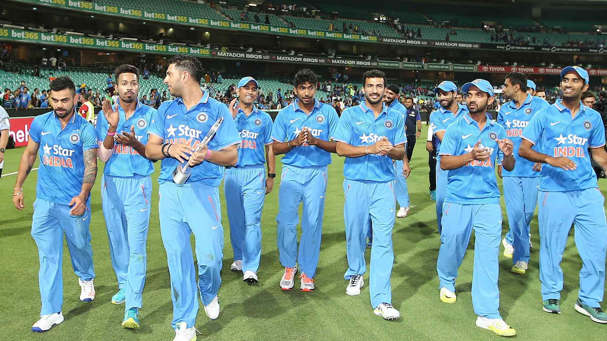 The Indian team take a victory lap after winning the Sydney T20. (Photo: AP)